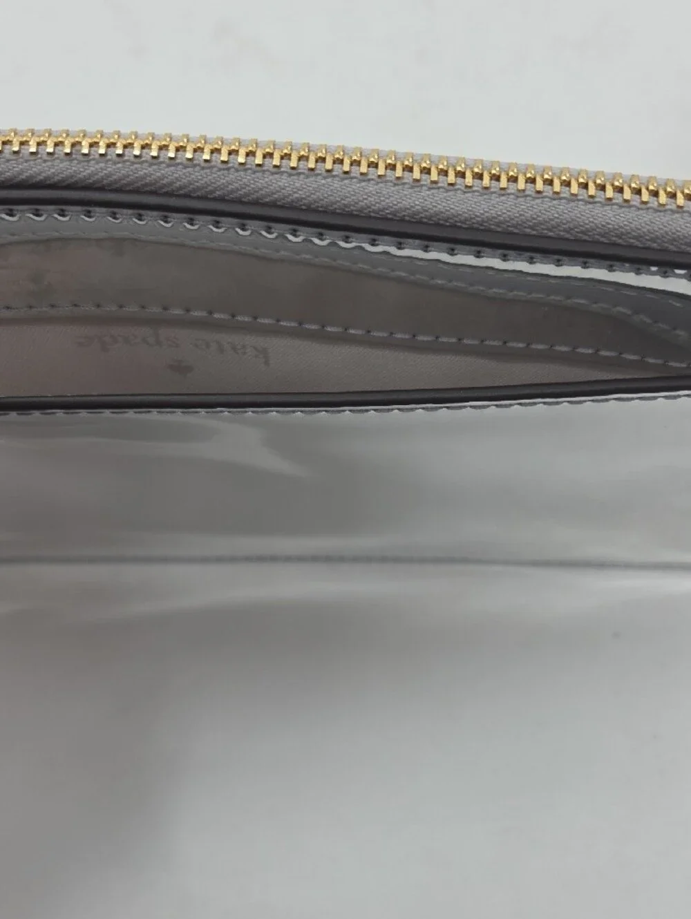 kate spade Metallic Silver Zip Wristlet